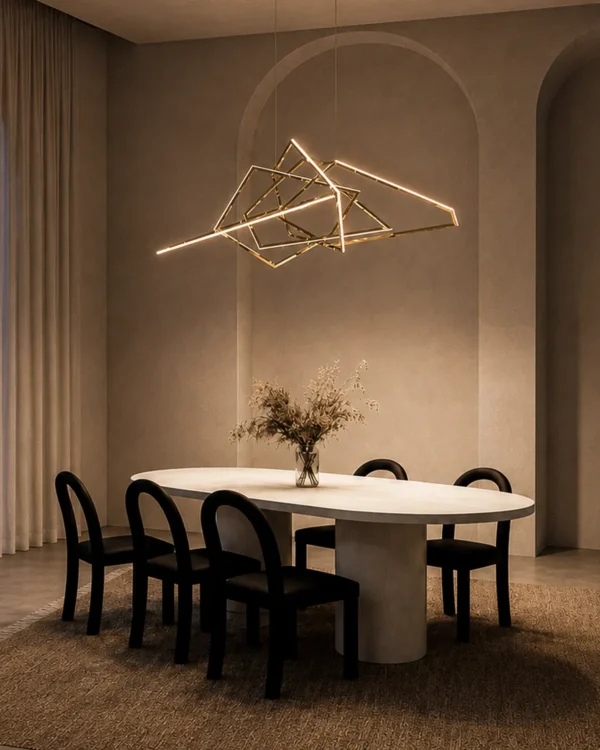Ailish gold geometric LED chandelier above a contemporary dining table