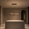 Alethea geometric LED chandelier illuminating a modern interior
