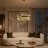 Alodia brass gold crystal chandelier in a modern living room interior