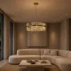 Alodia brass gold crystal LED chandelier illuminating a contemporary living room