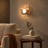 Calissa Turkish Bulgari wall lamp illuminating a contemporary living room