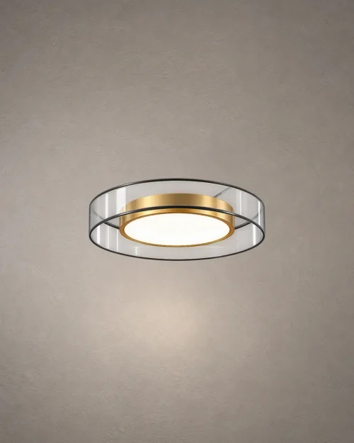 Cara gold LED ceiling lamp with circular metal and glass design