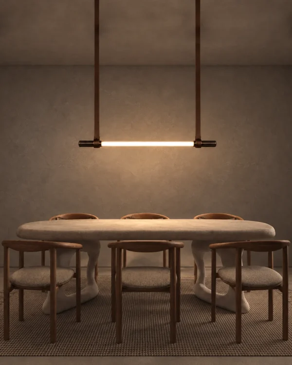 Clio linear chandelier illuminating a contemporary dining room