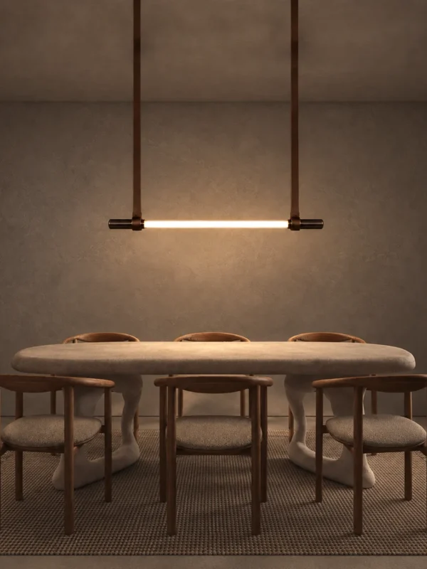 Clio linear chandelier illuminating a contemporary dining room