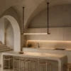 Clio modern linear chandelier above a contemporary kitchen island