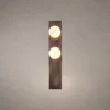 Double Sphere dark brown wall lamp with two illuminated spherical elements