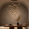 Esadora 15-light coffee and cognac round chandelier in a contemporary interior