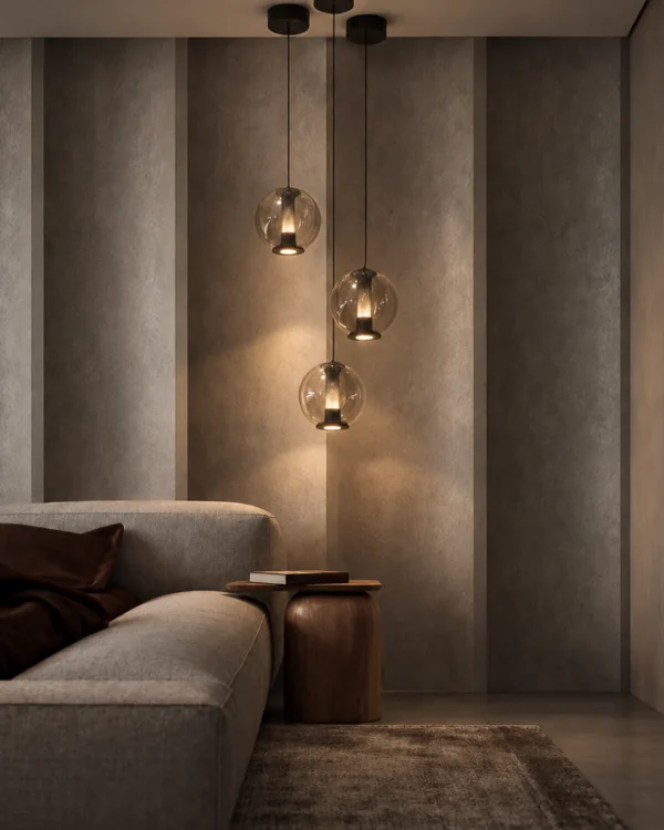Esadora Large coffee and cognac glass pendant lights in a contemporary living room
