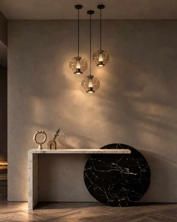 Esadora Large coffee and cognac pendant lights arranged in a modern interior