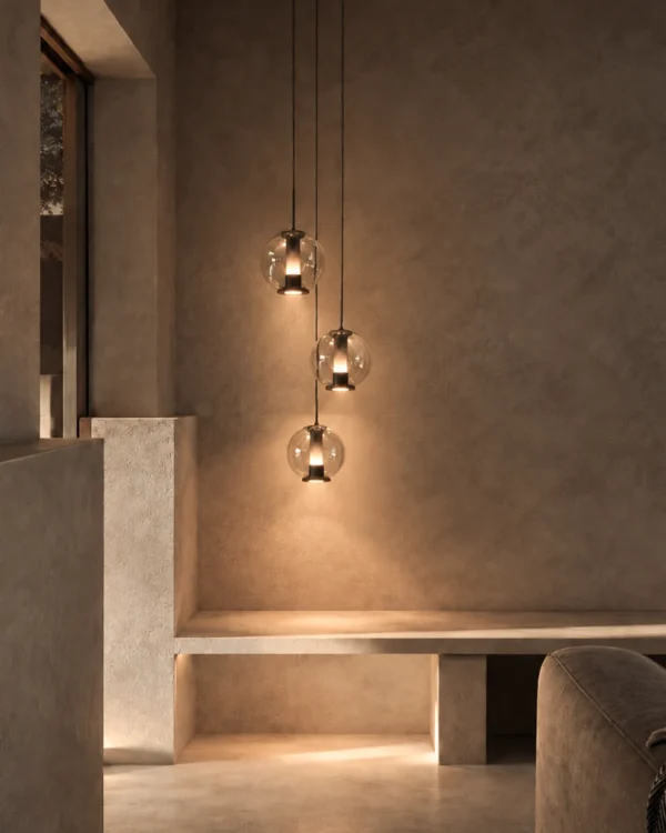 Esadora Medium coffee and cognac pendant lights arranged in a contemporary interior