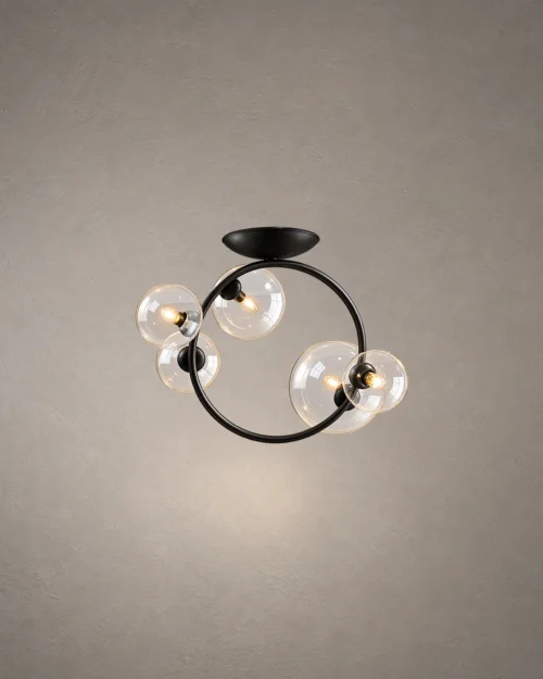 Hebe modern ceiling light with clear glass globes and sculptural iron frame