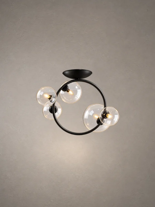 Hebe modern ceiling light with clear glass globes and sculptural iron frame