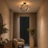 Hebe glass globe ceiling light illuminating a contemporary hallway