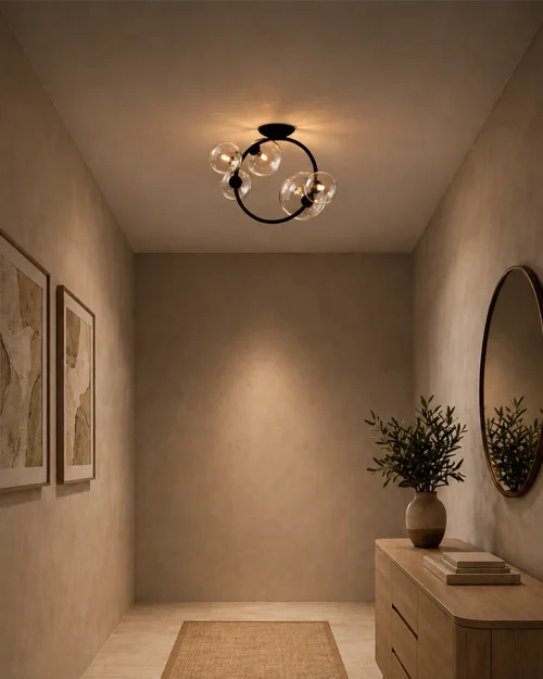 Hebe modern ceiling light with clear glass globes in a contemporary entryway