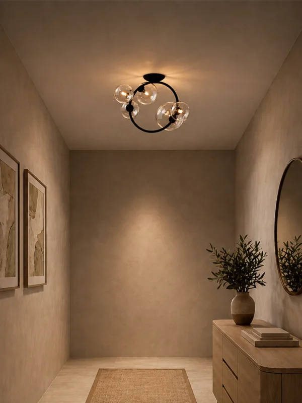 Hebe modern ceiling light with clear glass globes in a contemporary entryway