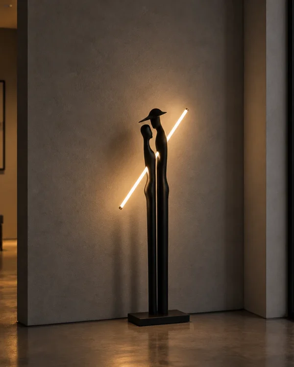Humano Couple sculptural floor lamp illuminating a contemporary interior