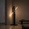 Humano Couple matte black floor lamp in a modern interior