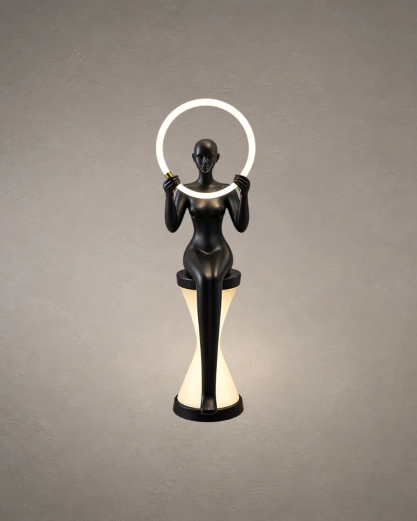 Humano Mirror matte black sculptural floor lamp with illuminated circular light