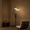 Humano Musician gunmetal floor lamp in a contemporary interior