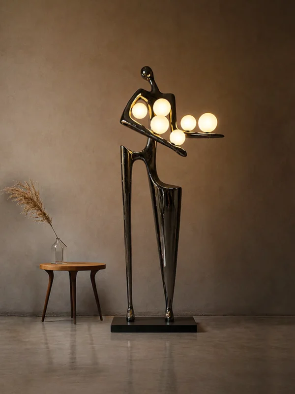 Humano Musician sculptural floor lamp illuminating a modern interior