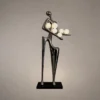 Humano Musician gunmetal sculptural floor lamp with illuminated spherical elements
