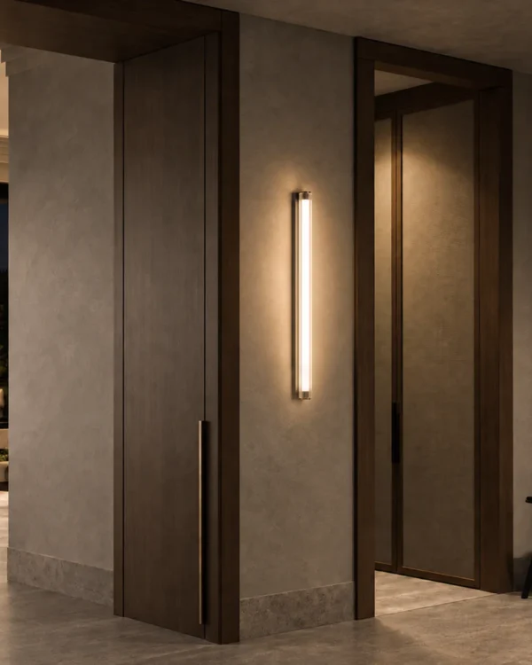 Keaton Gun Black linear wall lamp illuminating a modern hallway