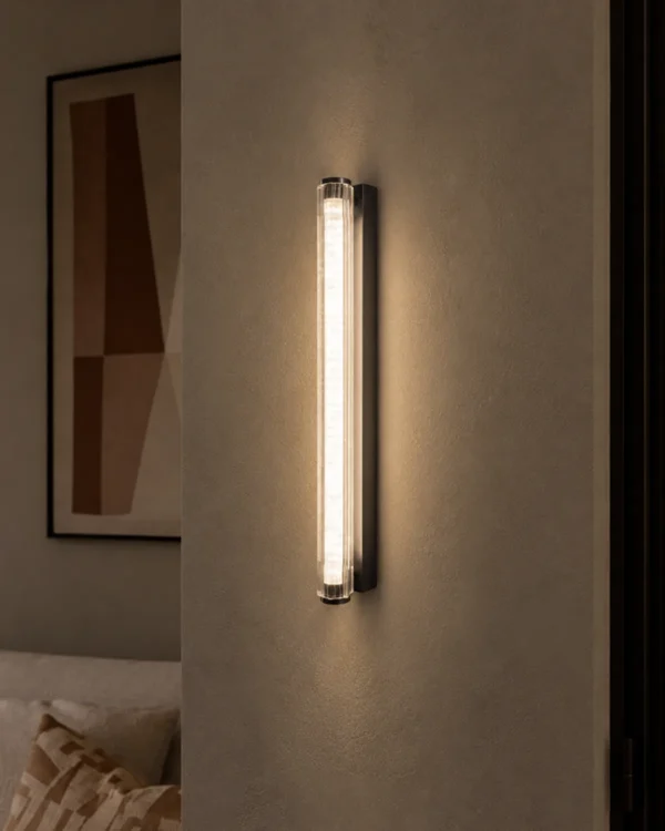 Keaton Gun Black linear wall lamp with a slim illuminated design