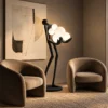 Maravel sculptural floor lamp with glowing globe lights in a contemporary living room