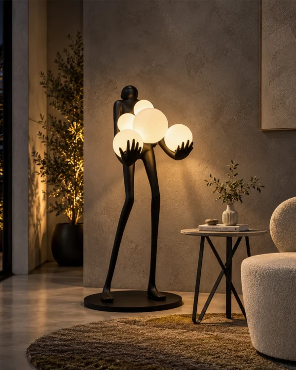 Maravel black sculptural floor lamp illuminating a modern interior
