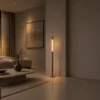 Safiya slim modern floor lamp providing ambient light in a contemporary living room