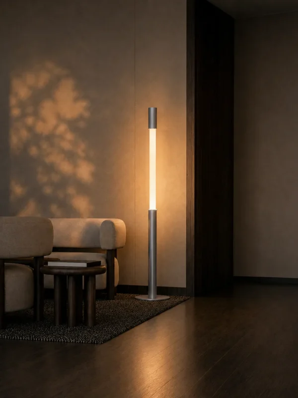 Safiya grey minimalist floor lamp illuminating a contemporary interior