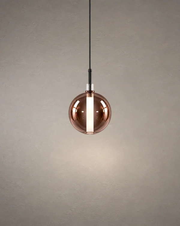 Siris Round copper spherical pendant light with black suspension detail