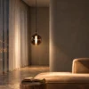 Siris Round copper spherical pendant light in a contemporary interior