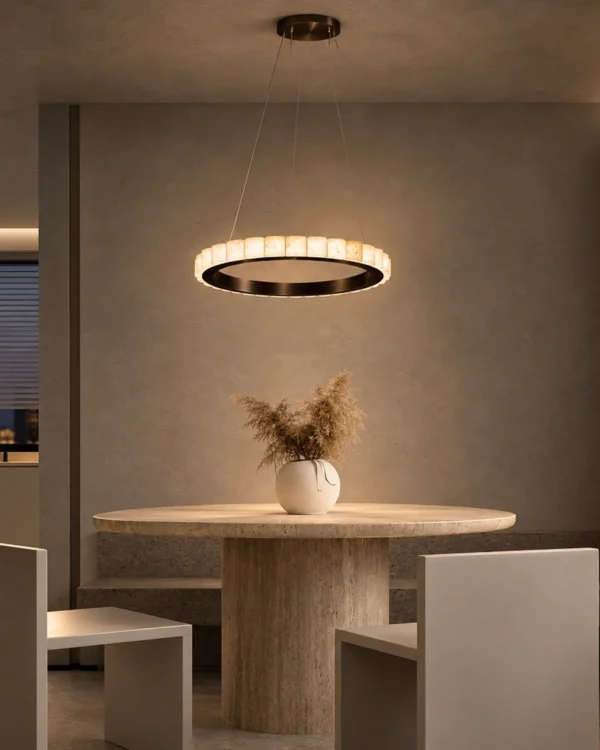 Soma dark brown circular chandelier above a contemporary dining table