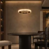 Soma dark brown circular chandelier in a modern dining interior