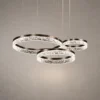 Valor Trio coffee gold chandelier with three suspended illuminated rings