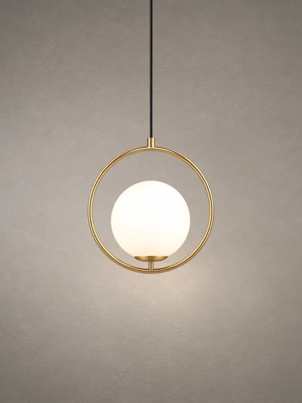 Abree Gold Circular Pendant Light Abree modern gold pendant light featuring an illuminated white glass globe within a circular metal frame