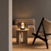 Adina contemporary table lamp displayed on a side table in a modern interior