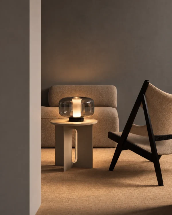Adina contemporary table lamp displayed on a side table in a modern interior