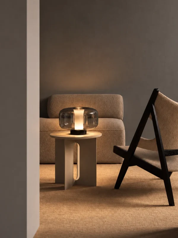 Adina contemporary table lamp displayed on a side table in a modern interior