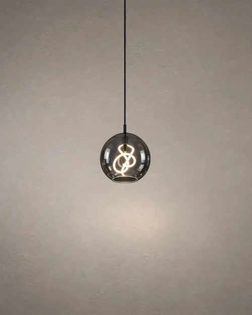 Akie modern spherical pendant light with smokey grey glass and decorative illuminated interior
