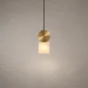 Alessandra Gold Marble Pendant Light Alessandra modern pendant light with a circular electroplated gold accent and illuminated square marble shade