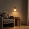 Alessandra Gold Pendant Light Living Room Alessandra gold and marble pendant light illuminating a modern living room seating area