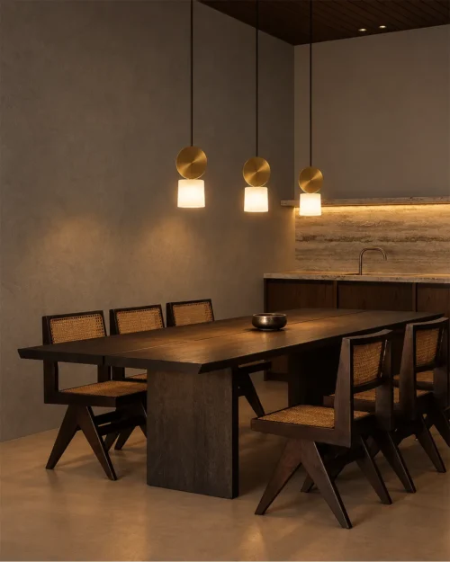 Alessandra Pendant Light Dining Room Three Alessandra gold and marble pendant lights suspended above a contemporary wooden dining table