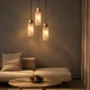 Alexandra Pendant Light Modern Living Room Three Alexandra marble pendant lights arranged at different heights in a modern living room