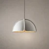 Amana modern split-dome pendant light featuring a textured grey shade and illuminated interior