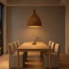 Amaya Brown Rattan Pendant Light Dining Room Amaya brown rattan pendant light with a woven bell-shaped shade above a contemporary dining table