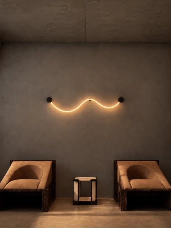 Archer wave-inspired wall lamp illuminating a contemporary seating area with two lounge chairs