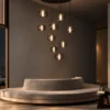 Aspen 11 Rectangle Chandelier with cascading glass pendants in a contemporary living room