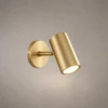 Aurelio Gold LED Wall Spotlight Aurelio modern cylindrical LED wall spotlight with an electroplated gold finish and circular mounting base